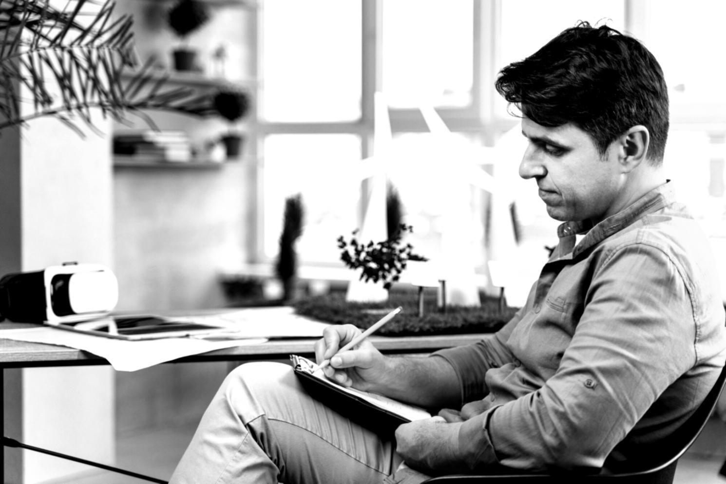 Professional workspace showing budget planning materials and strategic documents