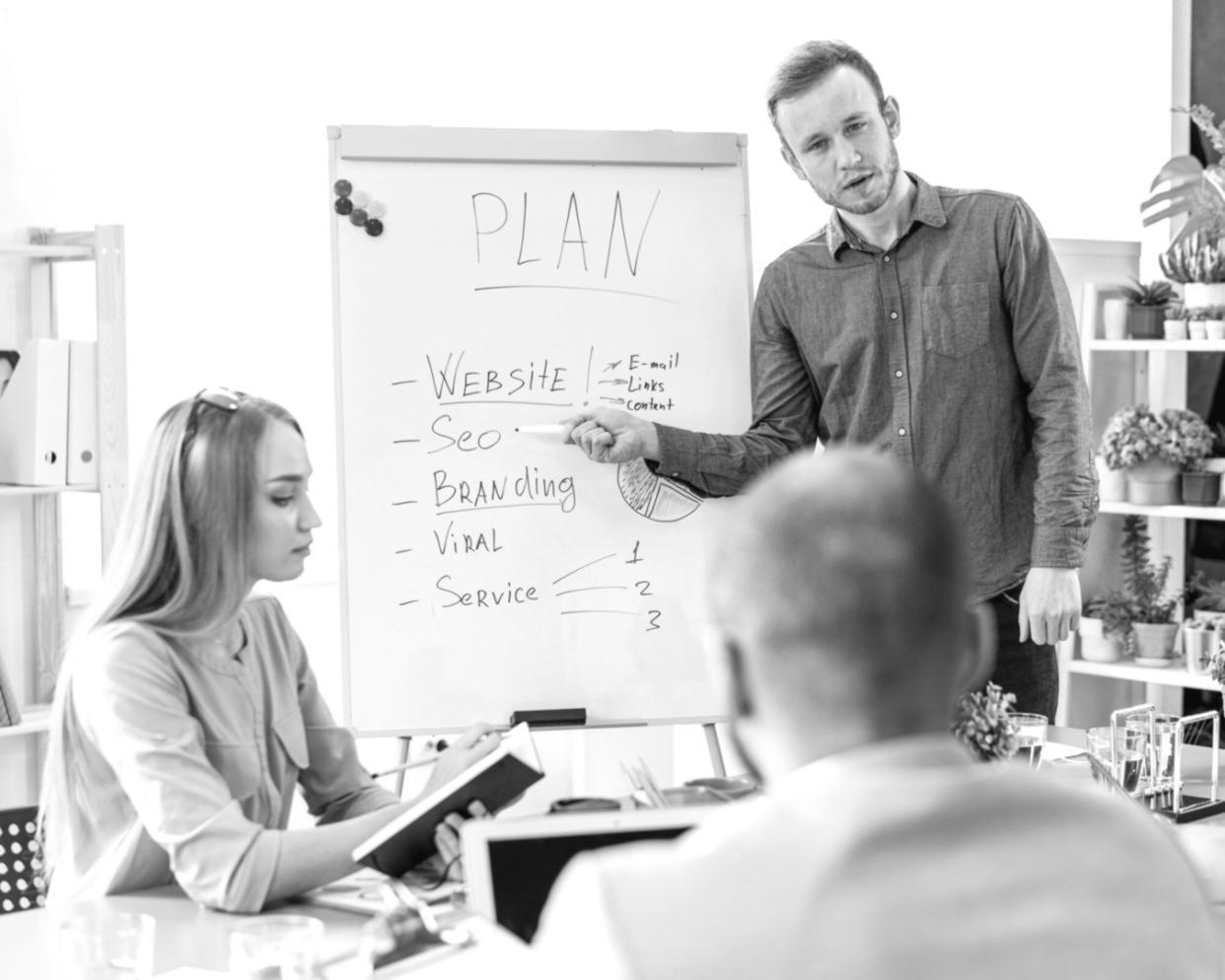 Professional presenting financial data to stakeholders